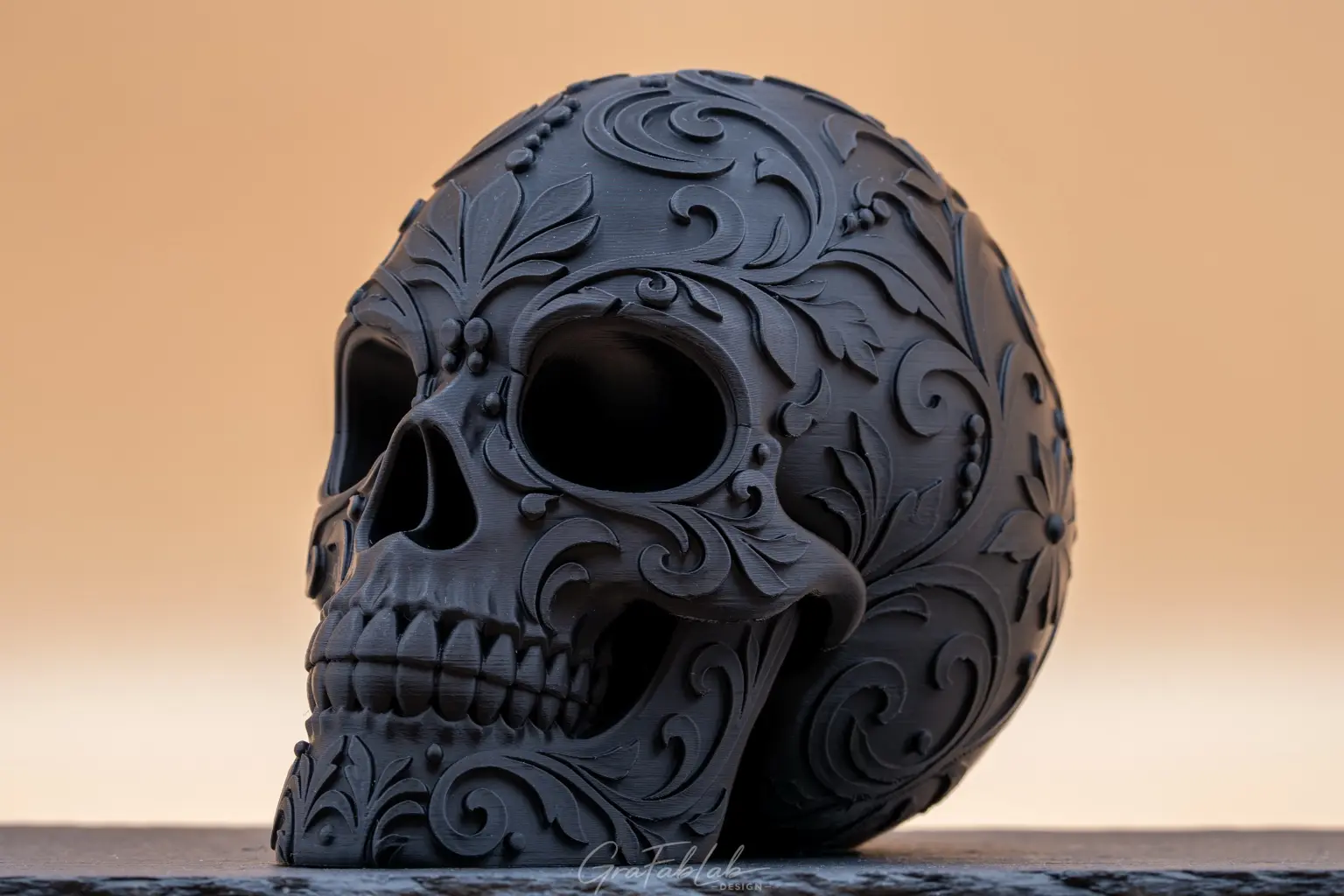 Three-quarter view of the black ornamental skull